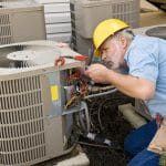 A/C Expert Working on AC System